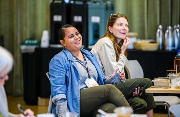 Two people participate in the Climate Changes Everything conference