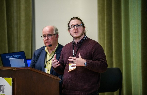 A man presents during the Climate Change Everything conference